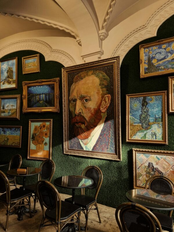 Explore an art-themed café interior featuring Vincent van Gogh paintings in Bucharest, Romania.